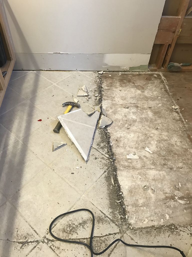 Starting to rip out the floor tiles - 28 Jan