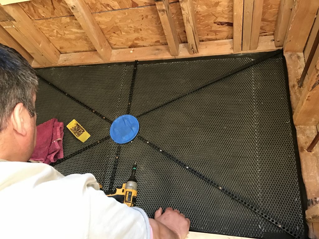 Next we put these pre-sloped plastic rods down so we can level the first layer of concrete. - 4 Mar 2017