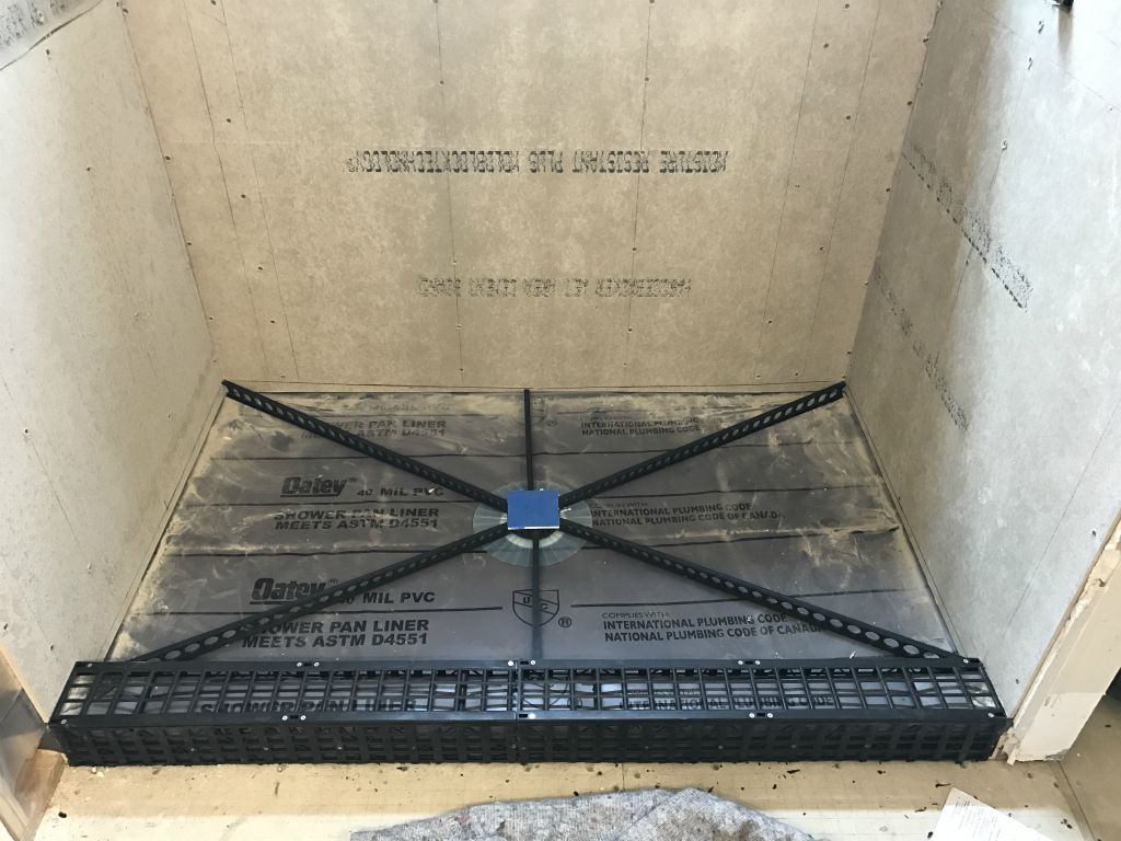 Cement board is all installed so now need final layer in shower tray.  Again, pre-sloped rods will ensure proper slope.