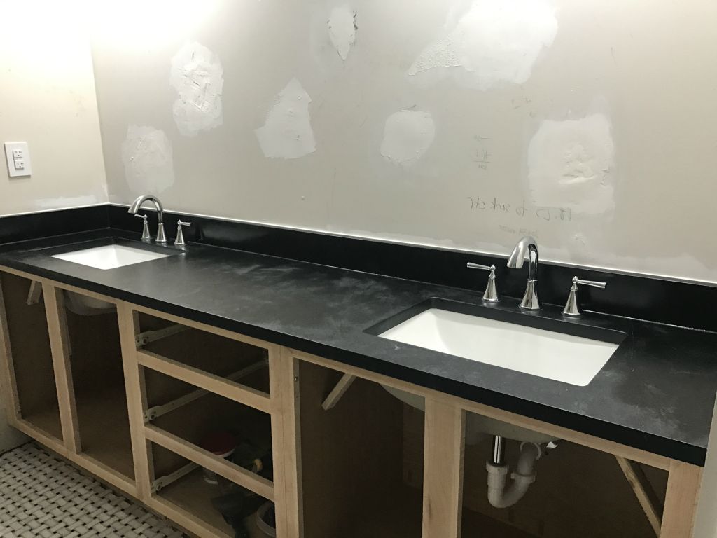 Both sets of taps installed.  Waiting to wipe excess oil off the counter.