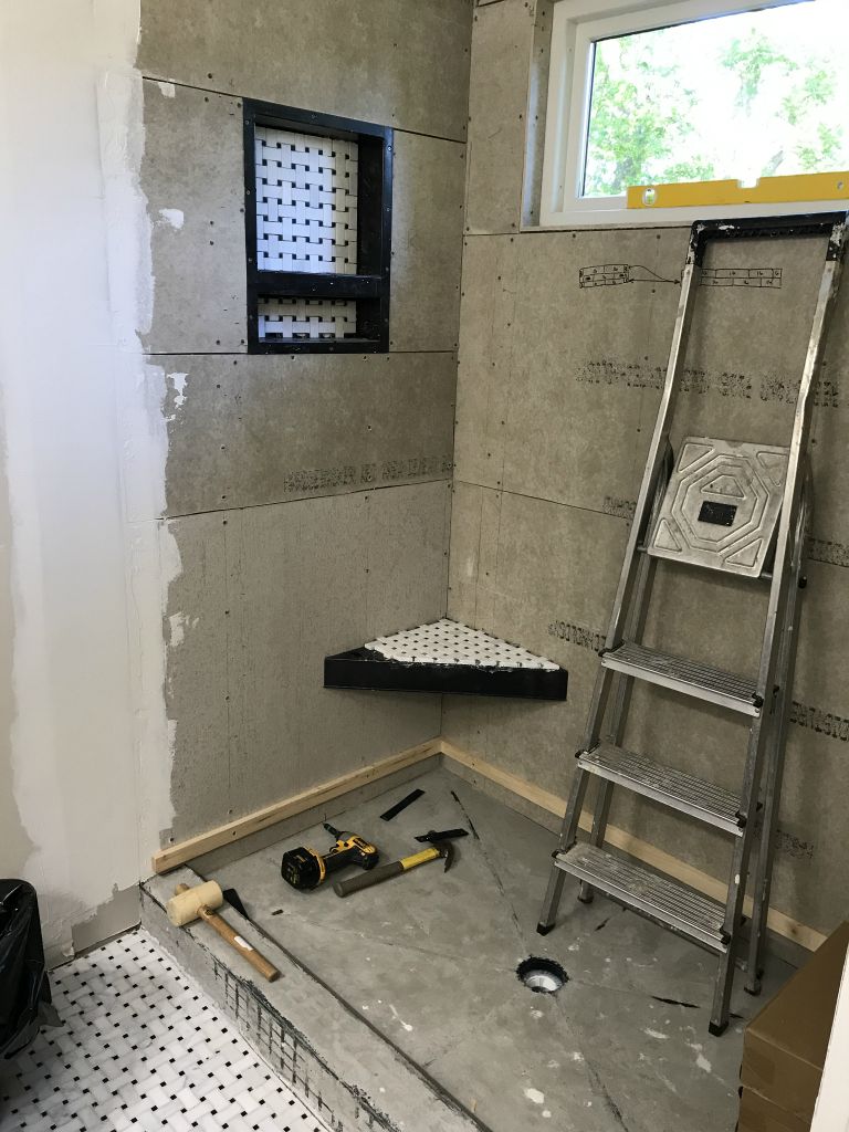 Cutting the tile to size before mixing up adhesive - 7 May 2017