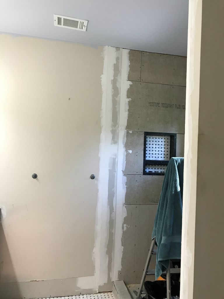 Patched the drywall and first coat of joint compound.