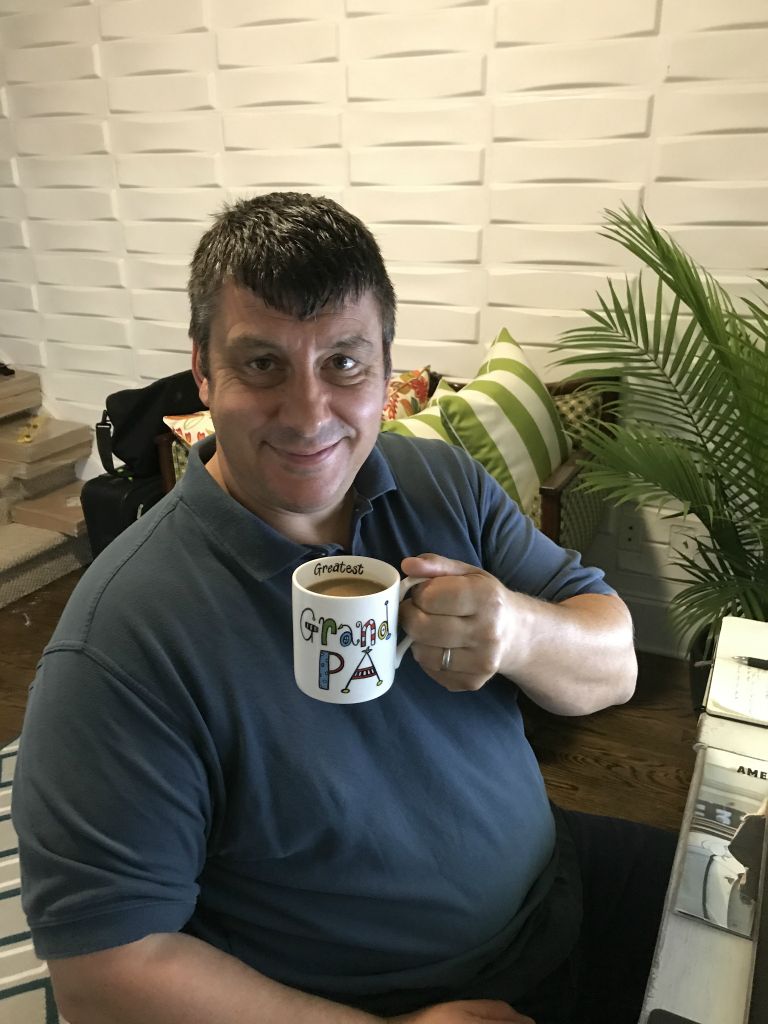 Nick demonstrates how much he loves his birthday mug from Eli and Charlie