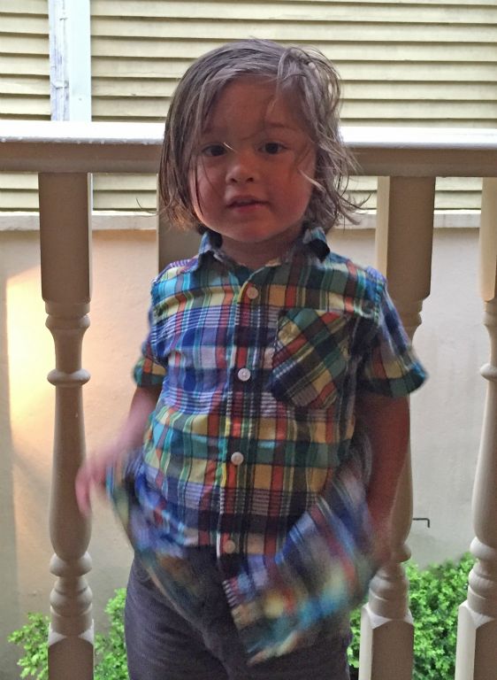 Archer (Caitlin's nephew), the ring-bearer.  (Or at least the bearer of the pillow)