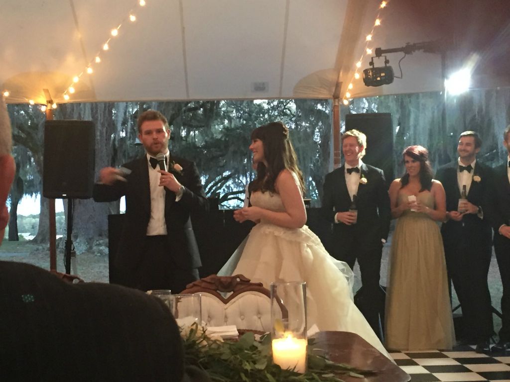 Ty says his thank-yous while his beautiful wife looks on.
