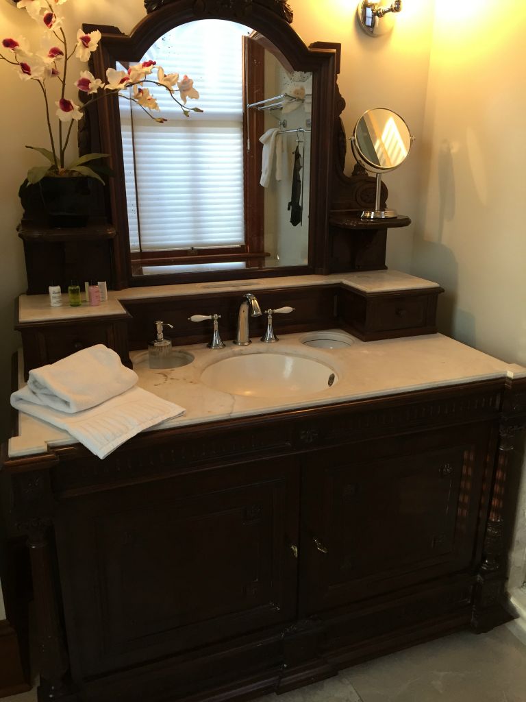 I love this antique vanity in the master bathroom at the Whitman.