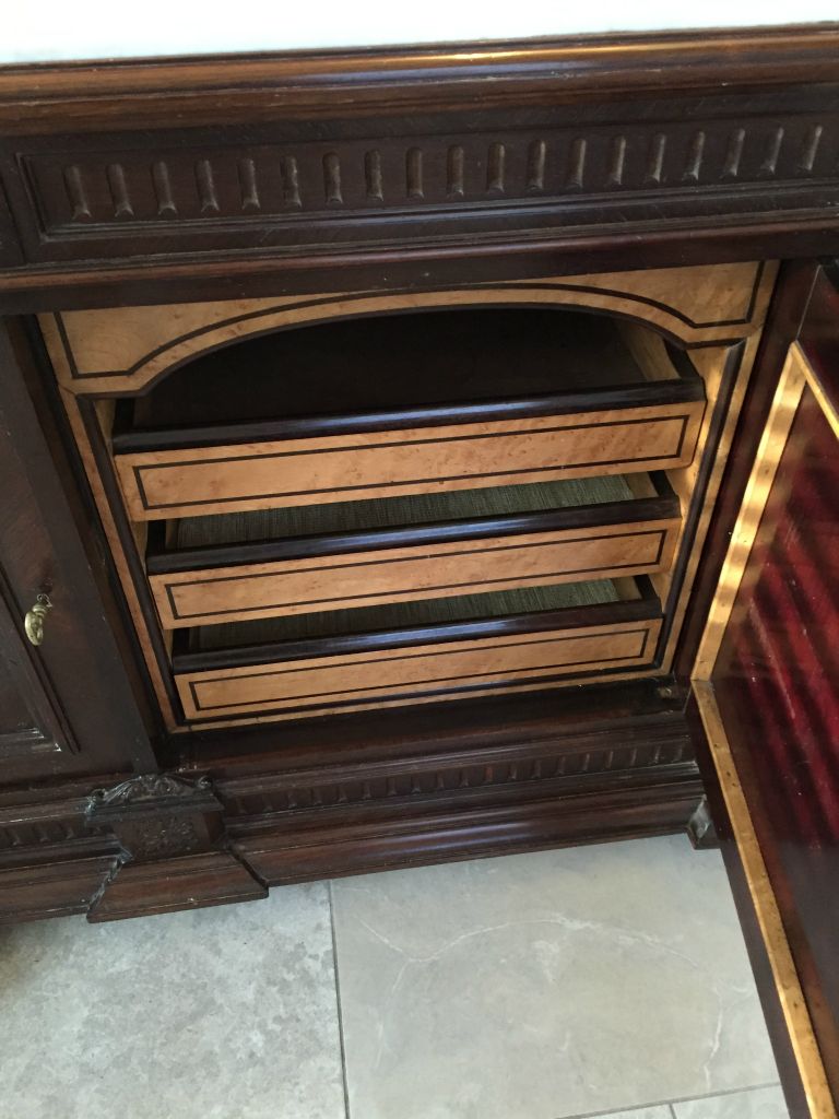 Inside the vanity there is this beautiful woodwork.