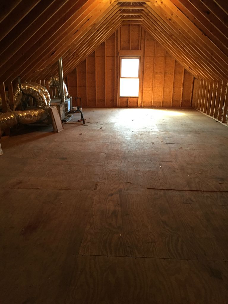 The loft space - this is why we bought the house - 1200 sq feet ready to be turned into rooms!  Looking toards the back of the house
