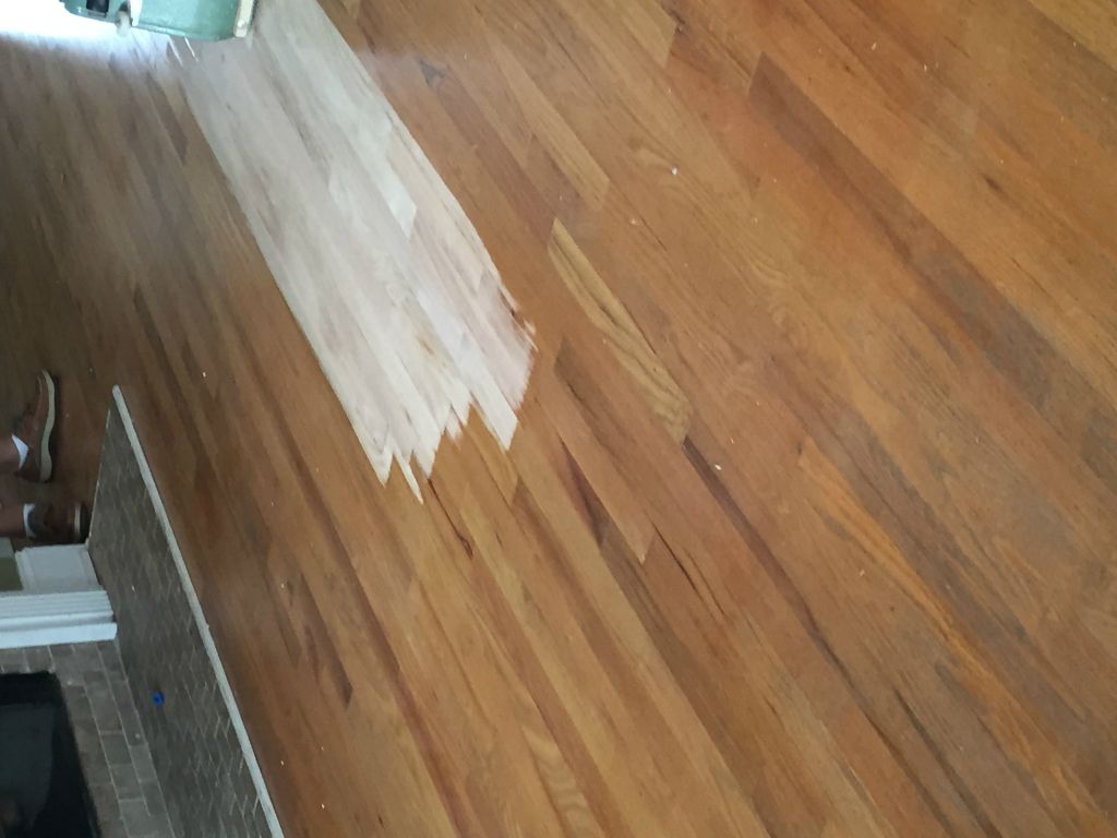 The floor guys start to sand the floors. - 11 Mar