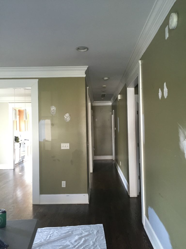 The ceilig is all painted and the floors refinished.  Love the new floor color!