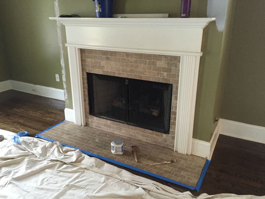 We decide to paint the fireplace - the lounge will be whites, blues and greys and the beige just doesn't go with that color scheme. - 19 Mar
