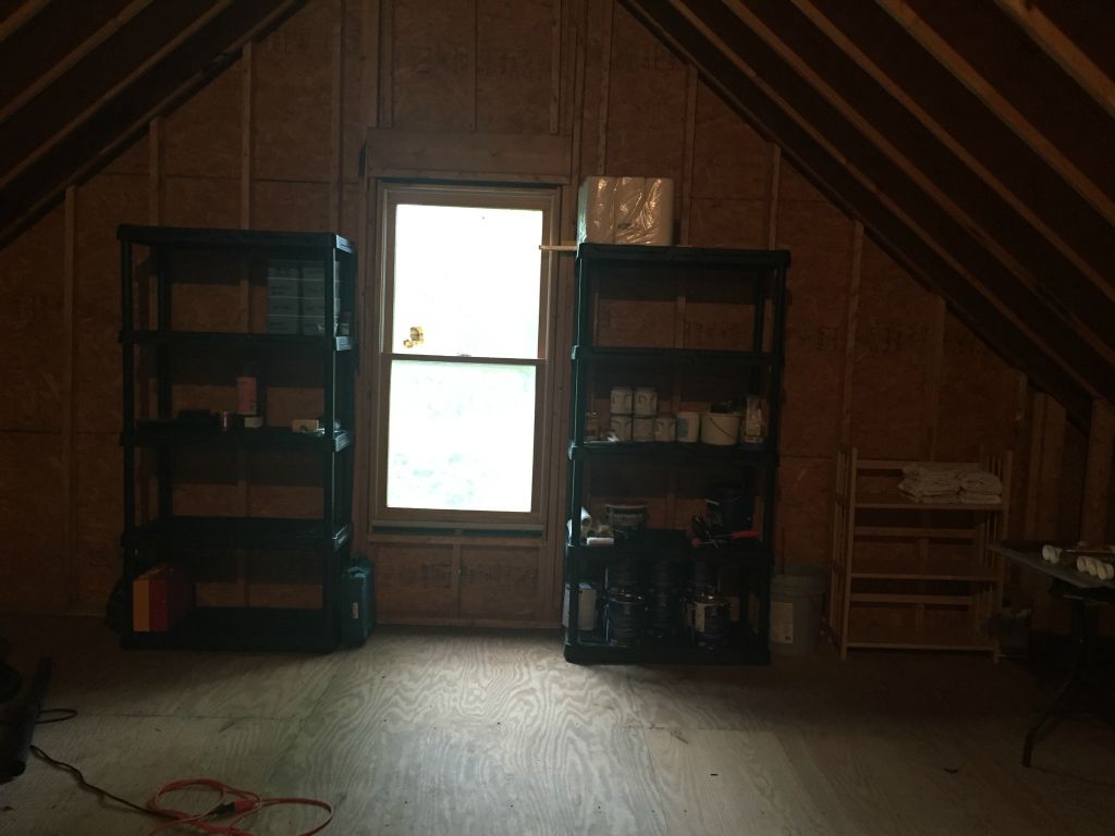 We start to get organized with our new DIY shelves