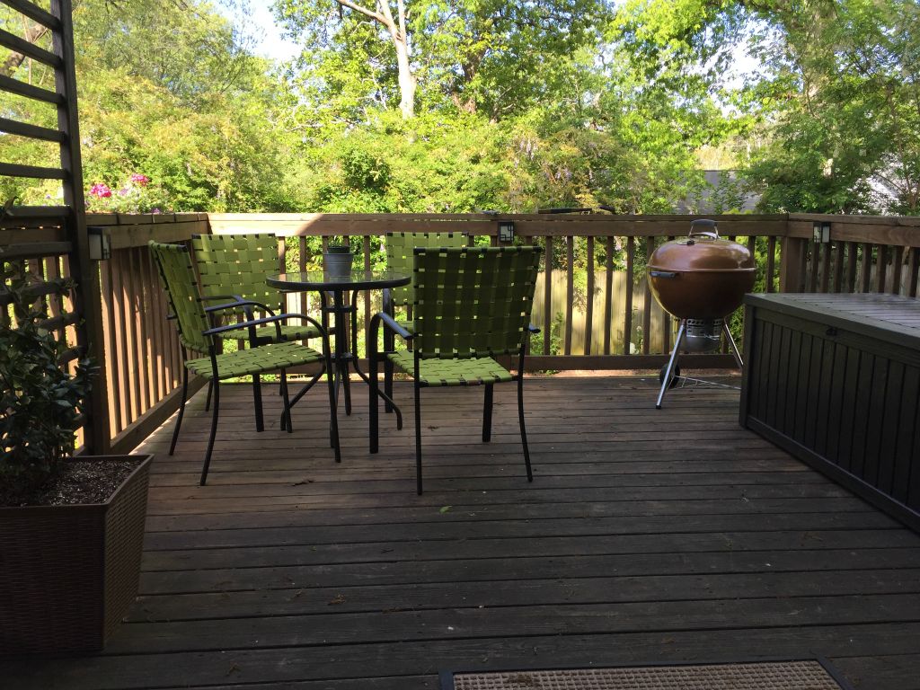 Four green chairs now and a storage box