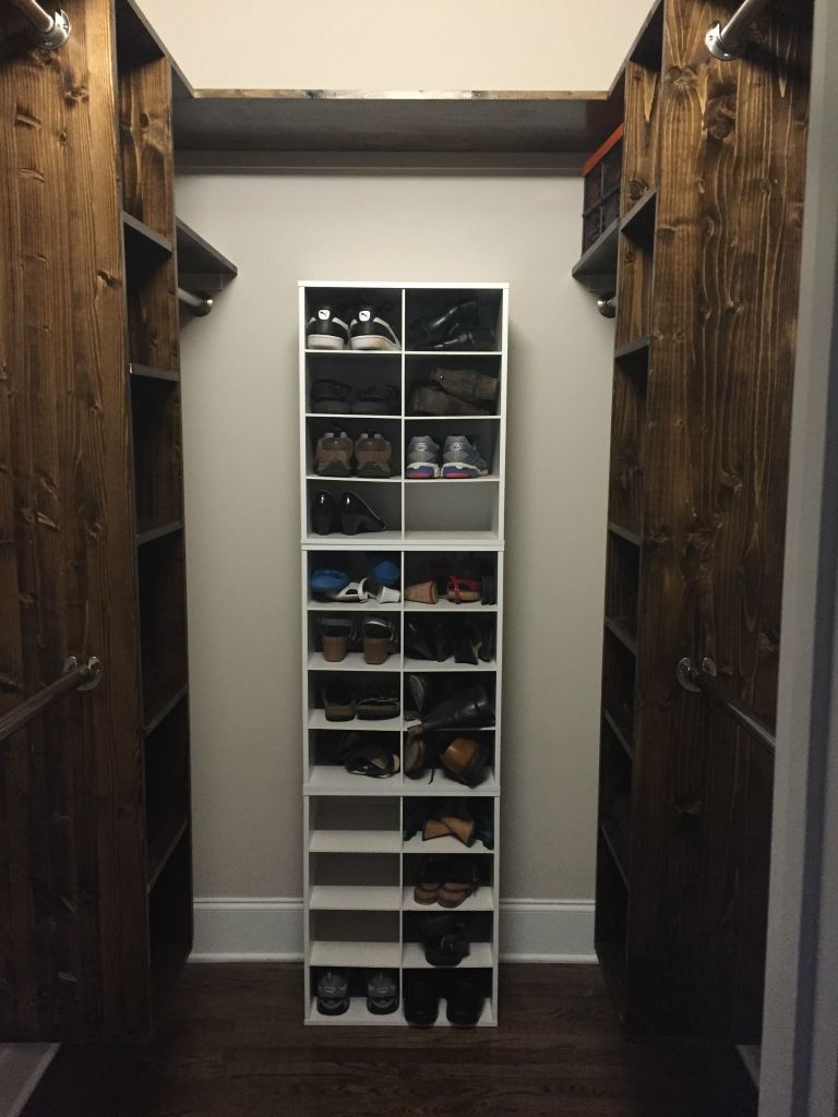 The closet all completed - each side has shelves, a tall rail and double rails.  So much storage!